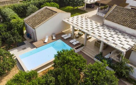 Villa Terrenove: Building, Property, Urban Design, Tree, Plant, Residential Area, Facade, Condominium, Roof, Real Estate