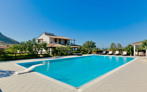 Villa Castellammare: Water, Sky, Plant, Swimming Pool, Building, Azure, Blue, Tree, Rectangle, Grass