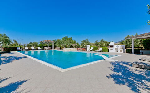 Villa Castellammare: Water, Sky, Building, Swimming Pool, Azure, Blue, Outdoor Furniture, House, Shade, Tree