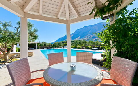 Villa Castellammare: Table, Furniture, Property, Sky, Water, Chair, Azure, Shade, Outdoor Furniture, Swimming Pool