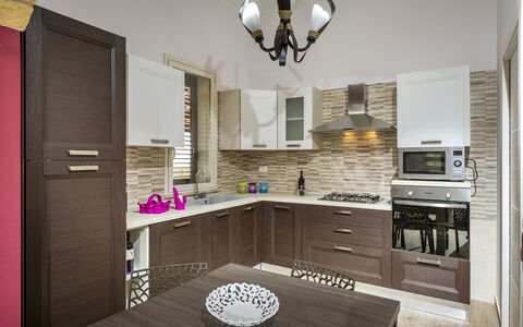 Villa Alcamo: Countertop, Cabinetry, Property, Furniture, Sink, Tap, Kitchen, Drawer, Wood, Lighting