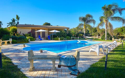 Villa Selinunte: Water, Sky, Plant, Swimming Pool, Tree, Azure, Shade, Outdoor Furniture, Grass, Leisure