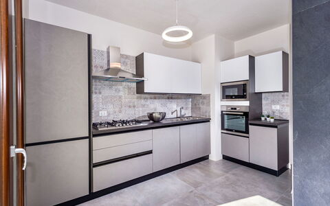 Villa Azzurra: Cabinetry, Countertop, Building, Furniture, Kitchen Appliance, Kitchen, Kitchen Stove, Wood, Home Appliance, Interior Design