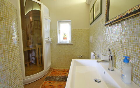 Villetta Verde: Tap, Mirror, Plumbing Fixture, Property, Sink, Bathroom, Bathtub, Architecture, Wood