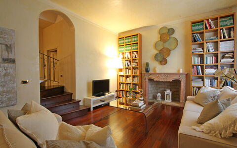 Villa Di Magra: Property, Furniture, Bookcase, Picture Frame, Couch, Shelf, Wood, Interior Design, Shelving, Floor