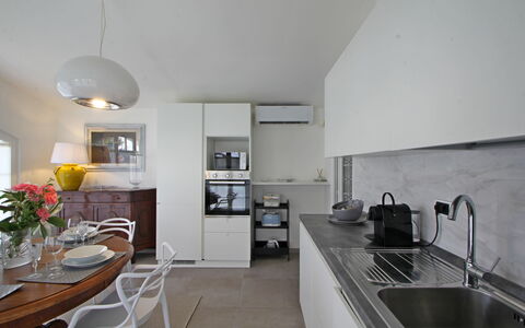 Villa Di Magra: Kitchen Sink, Sink, Cabinetry, Countertop, Tap, Table, Lighting, Chair, Interior Design, Kitchen