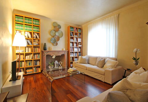 Villa Di Magra: Furniture, Property, Couch, Shelf, Wood, Interior Design, Bookcase, Table, Floor, Shelving