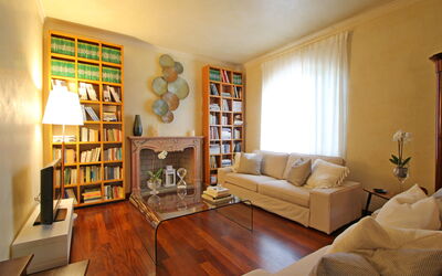 Villa Di Magra: Furniture, Property, Couch, Shelf, Wood, Interior Design, Bookcase, Table, Floor, Shelving