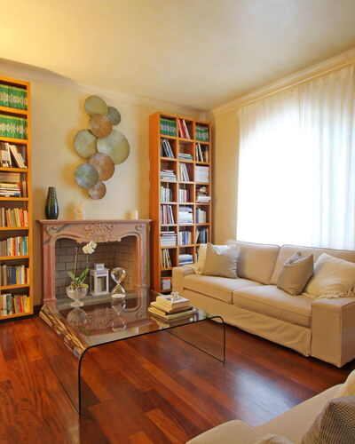 Villa Di Magra: Furniture, Property, Couch, Shelf, Wood, Interior Design, Bookcase, Table, Floor, Shelving