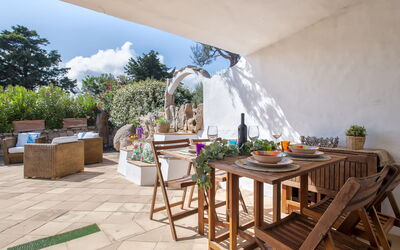 Porto Cervo 702: Table, Furniture, Plant, Property, Building, Cloud, Outdoor Furniture, Interior Design, Shade, Chair