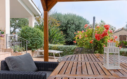 Cyca Holiday Home: Plant, Furniture, Property, Sky, Flower, Shade, Wood, Interior Design, Outdoor Furniture, Porch