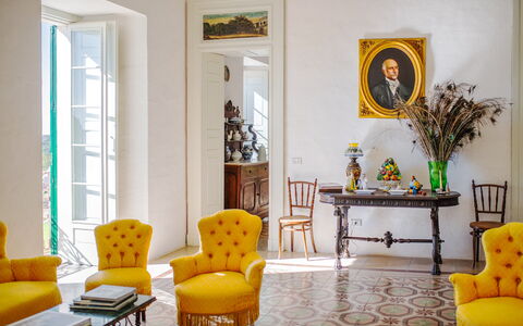 Masseria Tagliente: Furniture, Property, Table, Picture Frame, Plant, Building, Yellow, Orange, Lighting, Chair