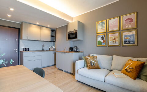 Suite Mareconero: Furniture, Property, Table, Picture Frame, Cabinetry, Couch, Azure, Lighting, Wood, Interior Design
