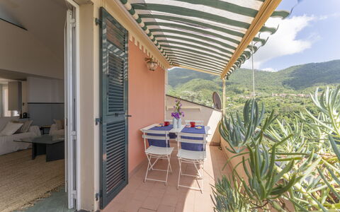 Emma House, Terrace and Sea View, Moneglia: Table, Plant, Furniture, Building, Chair, Shade, Cloud, Houseplant, Outdoor Furniture, Architecture