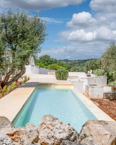 Villa La Selva: Water, Cloud, Property, Plant, Sky, Natural Landscape, Tree, Body Of Water, Swimming Pool, Grass