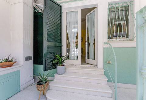 Suite Oltremare: Plant, Flowerpot, Houseplant, Building, Azure, Stairs, Interior Design, Door, Wood, Floor