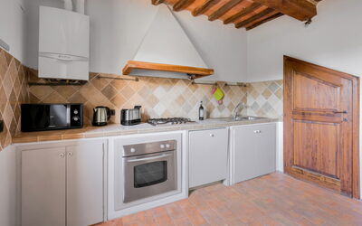 Borgo Apt.: Kitchen, Major Appliance, Kitchen Appliance, Flooring, Interior Design, Wood, Countertop, Ceiling, Floor, Kitchen Stove