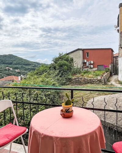 Lidia: Cloud, Sky, Table, Plant, Property, Furniture, Building, Window, Chair, Tableware