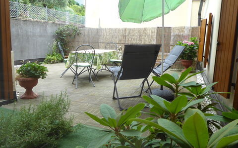 Comfort Apartment, Welness, Terrace: Plant, Furniture, Flowerpot, Chair, Houseplant, Building, Outdoor Furniture, Architecture, Table, Shade