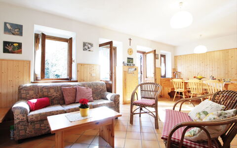 Baita a Pieve Tesino Mountain And Lake: Furniture, Table, Property, Picture Frame, Wood, Chair, Couch, Orange, Interior Design, Living Room