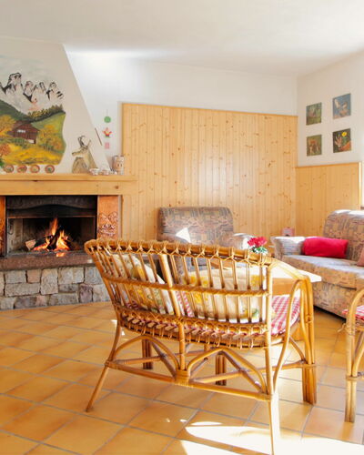 Baita a Pieve Tesino Mountain And Lake: Furniture, Property, Table, Wood, Textile, Interior Design, Comfort, Chair, Orange, Architecture