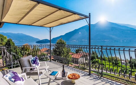 Home2Sunrise: Furniture, Outdoor Furniture, Chair, Shade, Mountain Range, Outdoor Table, Resort, Porch, Eco Hotel, Balcony