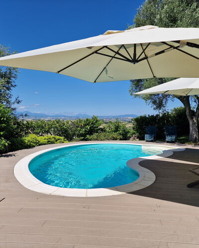 Villa Gelso: Water, Plant, Property, Sky, Swimming Pool, Umbrella, Azure, Shade, Tree, Body Of Water