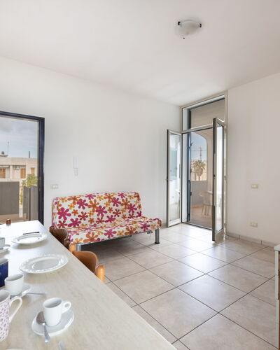 Andromeda Apartment In Gallipoli: Furniture, Table, Tableware, Building, Wood, Comfort, Interior Design, Flooring, Floor