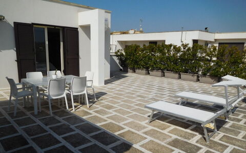 Loft San Giovanni in Gallipoli: Property, Furniture, Sky, Building, Shade, Outdoor Furniture, Architecture, Plant, Interior Design, Chair