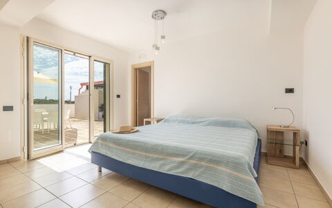 Loft San Giovanni in Gallipoli: Floor, Flooring, Interior Design, Ceiling, Apartment, Room, Bedroom, Wood Stain, Bed, Chair