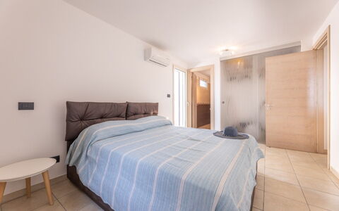 Loft San Giovanni in Gallipoli: Bed, Interior Design, Bedroom, Floor, Flooring, Furniture, Bed Sheet, Bedding, Wood, Room