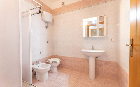 Apartment Balcony Sea View - Gallipoli: Mirror, Sink, Property, Tap, Plumbing Fixture, Bathroom Sink, Bathroom, Purple, Interior Design