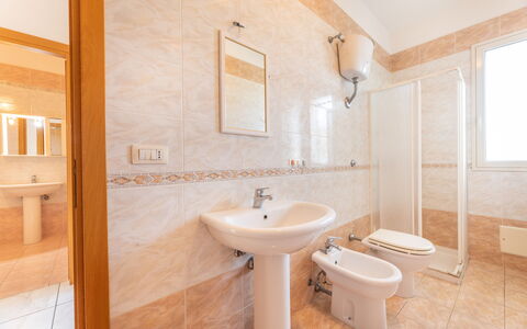 Apartment Balcony Sea View - Gallipoli: Brown, Mirror, Tap, Sink, Plumbing Fixture, Property, Bathroom Sink, Bathroom, Wood, Purple