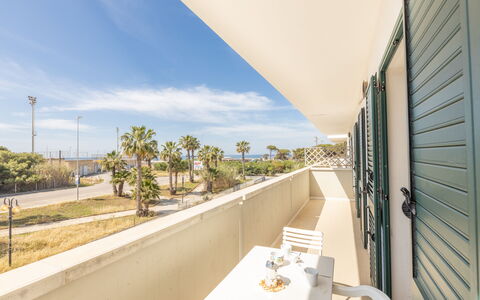 Apartment Balcony Sea View - Gallipoli: Sky, Cloud, Property, Plant, Building, Shade, Tree, House, Real Estate, Arecales