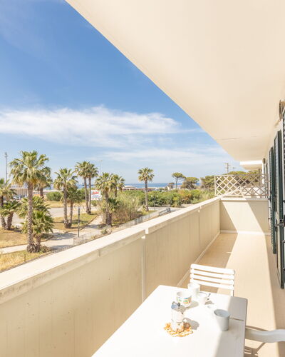 Apartment Balcony Sea View - Gallipoli: Sky, Cloud, Property, Plant, Building, Shade, Tree, House, Real Estate, Arecales
