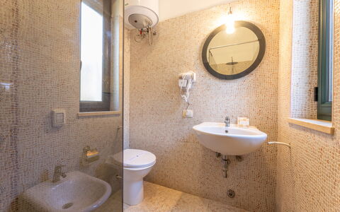 Villetta Estiva With Private Pool Gallipoli: Mirror, Brown, Tap, Plumbing Fixture, Sink, Bathroom Sink, Property, Bathroom, Purple, Wood