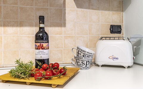 Florentine Careggi Loft: Food, Bottle, Glass Bottle, Alcoholic Beverage, Drink, Ingredient, Natural Foods, Kitchen Appliance, Wine Bottle