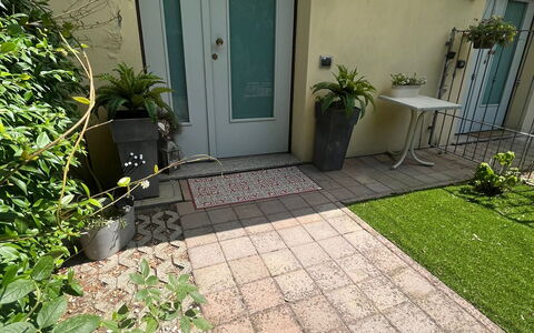 Bell'aria Apartment: Plant, Property, Building, House, Road Surface, Land Lot, Grass, Door, Residential Area, Wall