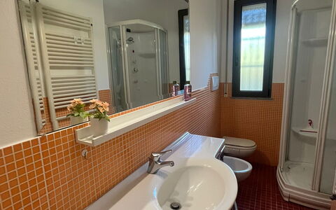 Bell'aria Apartment: Mirror, Tap, Sink, Plumbing Fixture, Bathroom Sink, Bathroom, Purple, Wood, Architecture, Interior Design