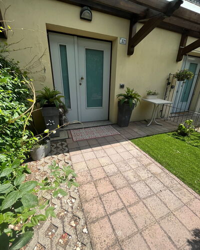 Bell'aria Apartment: Plant, Property, Building, House, Road Surface, Land Lot, Grass, Door, Residential Area, Wall