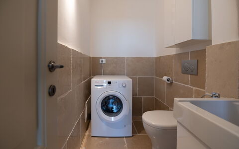 Villa Monamu: Brown, Plumbing Fixture, Laundry Room, Bathroom, Purple, Toilet Seat, Toilet, House, Clothes Dryer