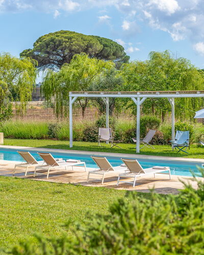 Villa Monamu: Cloud, Water, Plant, Sky, Azure, Botany, Swimming Pool, Tree, Natural Landscape, Shade