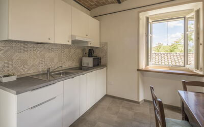 Arpusè - Ca Fredo Apartment with Pool: Flooring, Wood, Kitchen, Interior Design, Floor, Countertop, Ceiling, Major Appliance, Kitchen Appliance, Kitchen Sink