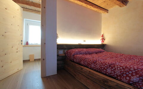 Baita Tersilia Mountain And Lake, Veneto: Interior Design, Wall, Flooring, Floor, Wood, Furniture, Ceiling, Bedroom, Room, Bed