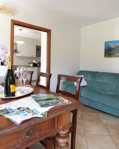 Apartment With Garden, Del Corlo Lake, Belluno: Table, Furniture, Picture Frame, Property, Plant, Couch, Green, Flower, Interior Design, Wood