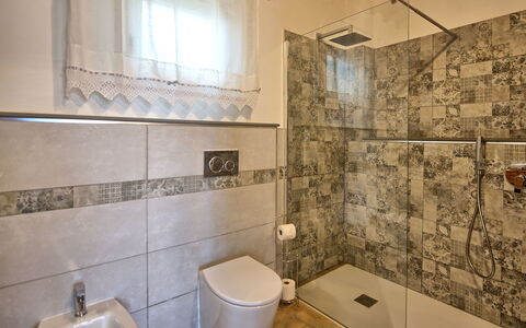 Casa Andrea: Property, Plumbing Fixture, Bathroom, Building, Interior Design, Purple, Lighting, Architecture, Floor, Flooring
