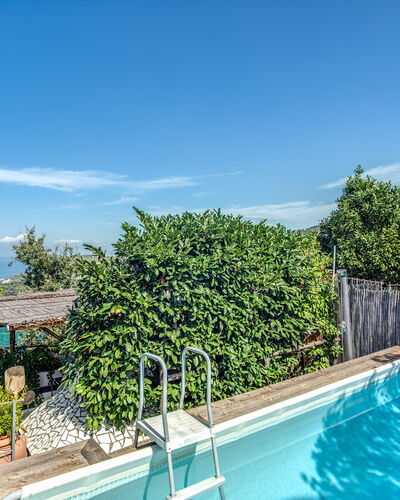 Villa Solaria with Private Pool: Water, Sky, Plant, Cloud, Property, Swimming Pool, Azure, Vegetation, Tree, Residential Area