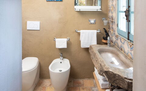 La Casa Sul Forte: Mirror, Plumbing Fixture, Tap, Sink, Bathroom Sink, Bathroom, Purple, Interior Design, Floor, Wall