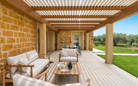 Cavial: Property, Furniture, Plant, Table, Wood, Interior Design, Shade, Architecture, Outdoor Furniture, Porch