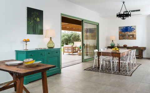 Cavial: Table, Furniture, Picture Frame, Interior Design, Chair, Wood, Building, Flooring, Living Room, Houseplant